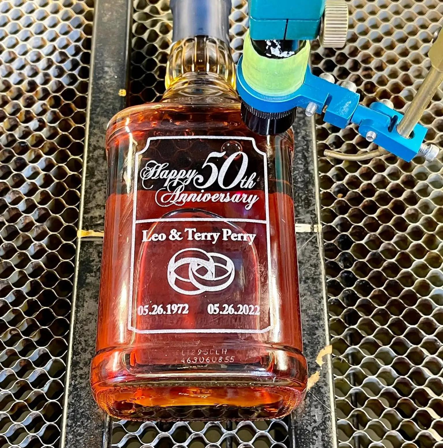 laser engraved glass bottle with fine details laser engraved glass bottle with fine details